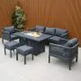 Aurora lounge garden furniture set featuring a modern grey rope design with comfortable cushions and fire pit table. Elegantly arranged in a garden setting with sleek cladding in the background
