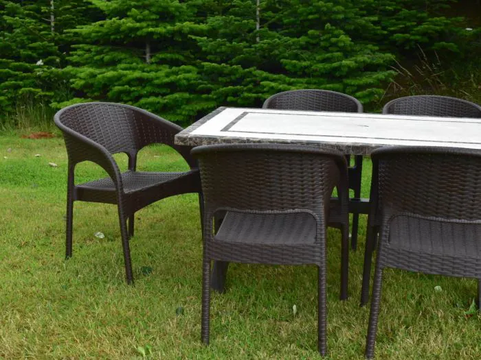 Side View of the Killiney 6 Seat with Brown Panama Chairs