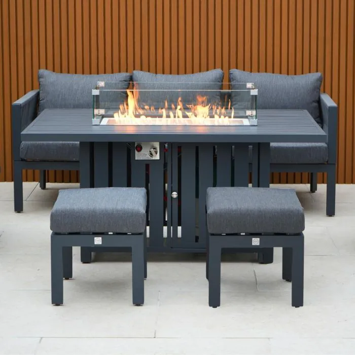 Aurora lounge garden furniture set featuring a modern grey rope design with comfortable cushions and fire pit table. Elegantly arranged in a garden setting with sleek cladding in the background