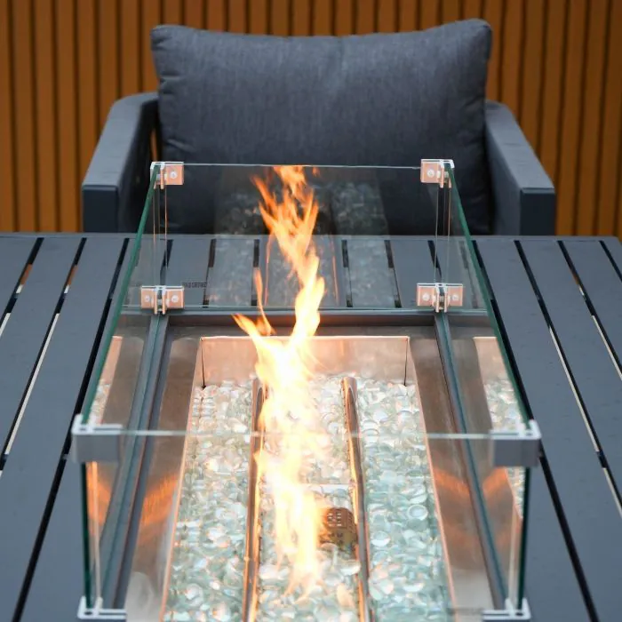 Aurora lounge garden furniture set featuring a modern grey rope design with comfortable cushions and fire pit table. Elegantly arranged in a garden setting with sleek cladding in the background