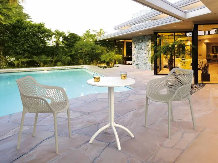 2 Taupe Air XL Chairs and White Octopus Table Set in the Garden by the Pool 