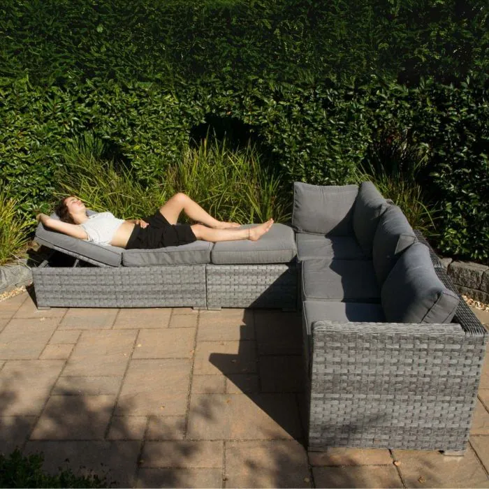 High-quality grey rattan corner sofa set that doubles as a sun lounger, with thick cushions and rust-resistant frame