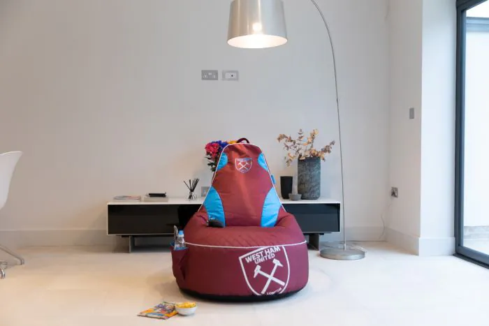 Front View of the West Ham United F.C. Gaming Bean bag Chair in the Living Room 