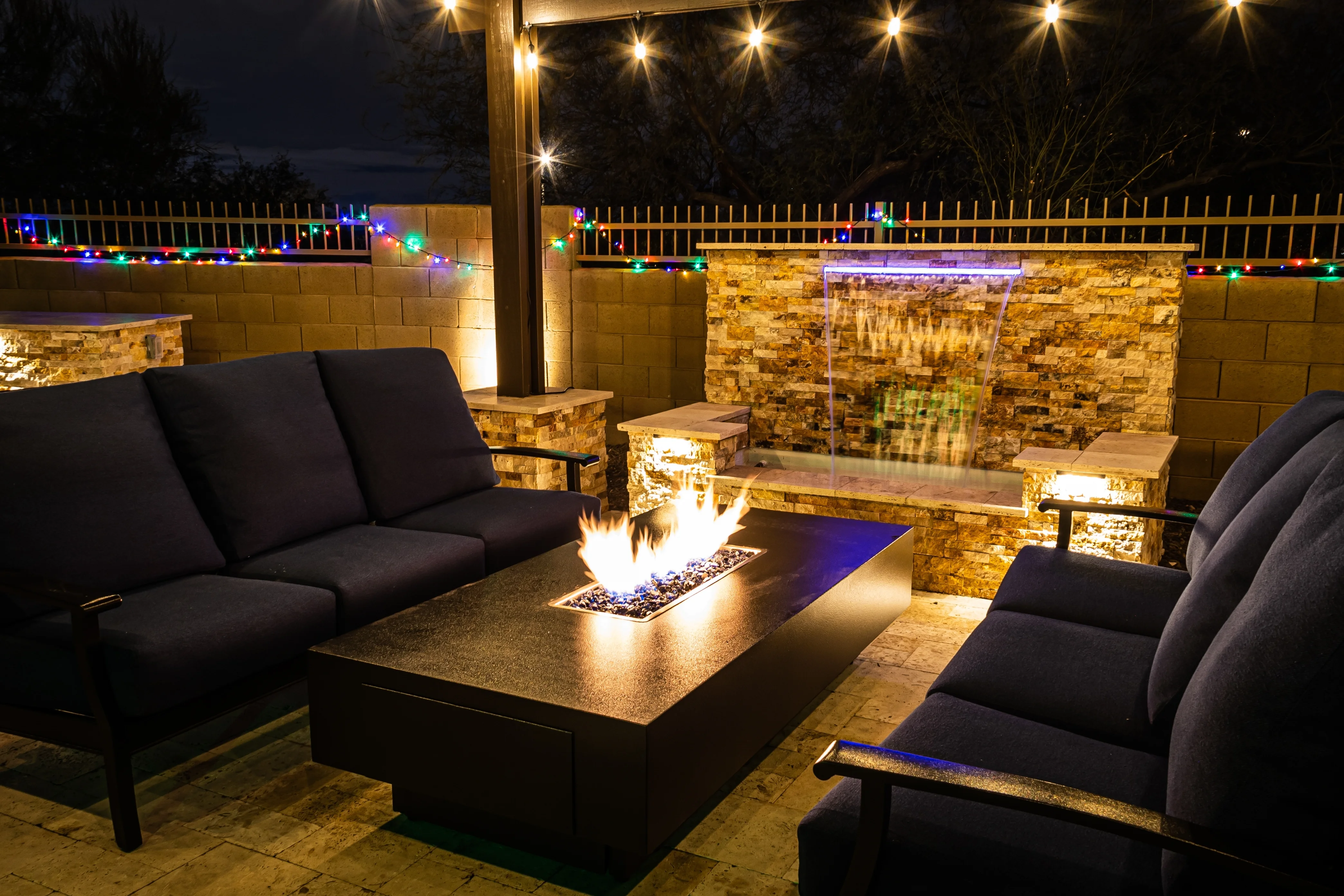 Firepit table with fabric outdoor sofa