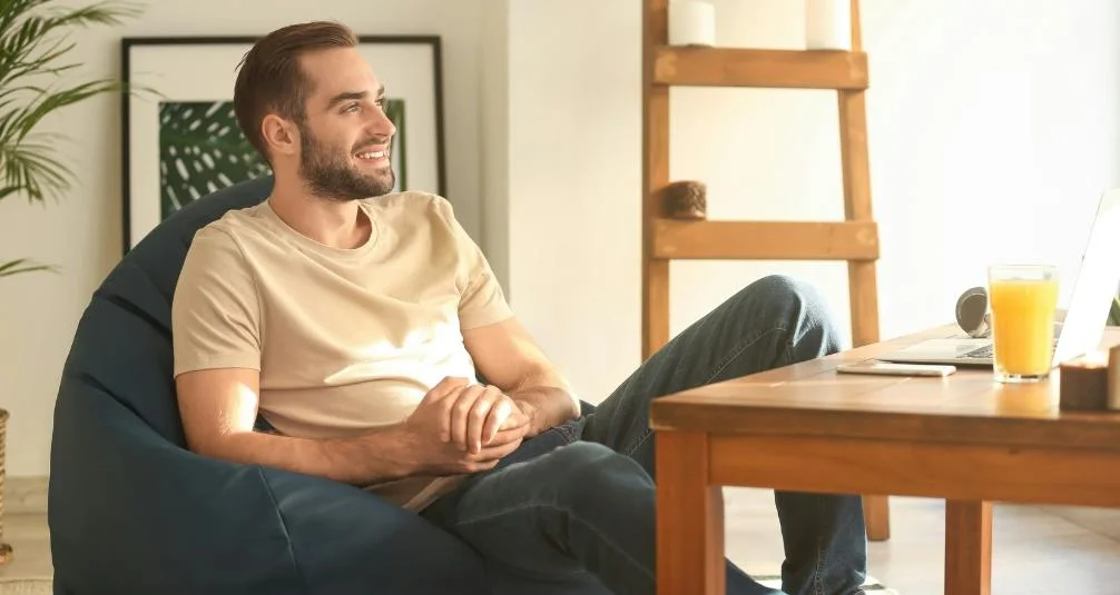 Man sitting on beanbag