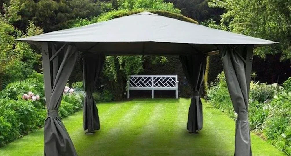 garden canopy on lawn with garden bench