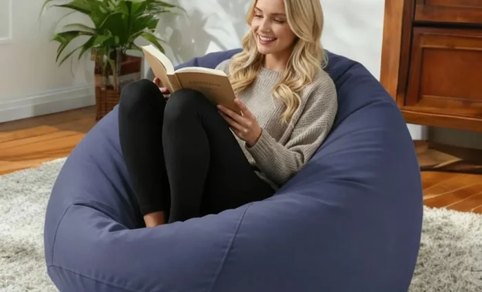 Large blue bean bag used as a reading chair in a living room