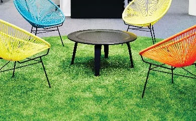 Mondern design chairs on artificial grass